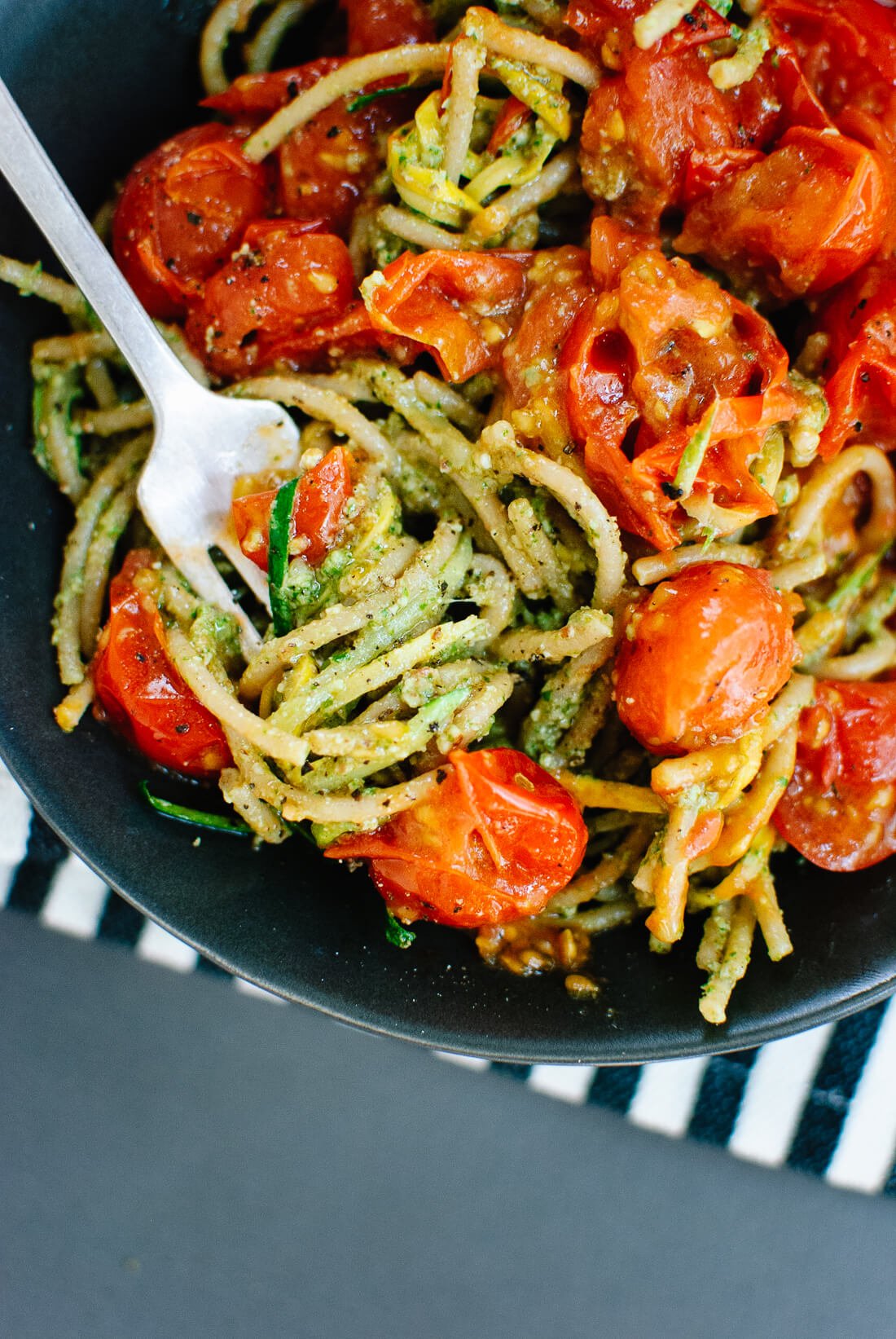 cherry tomatoes pesto squash noodles and spaghetti